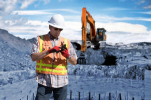 man in hard hat on phone